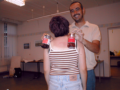 Augusto helping Tara to pich the right colour matching her sun burn