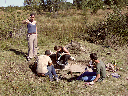 Carine, Augusto, Marlen and Fabio working in the midday sun
